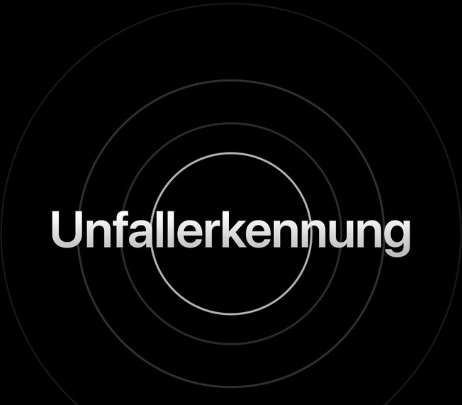 Das Wort «Unfallerkennung», von dem Ringe ausgehen.