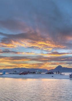 Visitors to the Bonneville Salt Flats in UT look over the Great Salt Lake. Photo by Bob Wick.