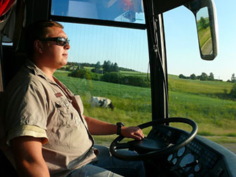 Man driving a bus.