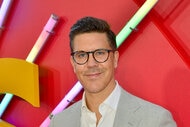 Fredrik Eklund seen on a red carpet at movie premiere