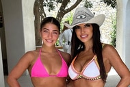 Teresa Giudice and Gia Giudice smiling together in swimwear.