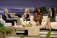 Andy Cohen, Sutton Stracke, Garcelle Beauvais, Crystal Kung Minkoff talk in front of a Beverly Hills themed set during the Season 13 Reunion.