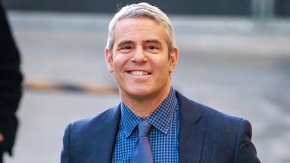Andy Cohen smiles as he heads to the Jimmy Kimmel Live studios.