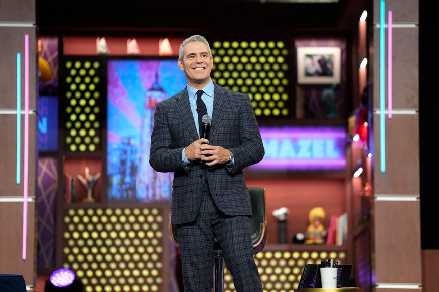 Andy Cohen on stage during a taping of WWHL at Bravocon 2022.