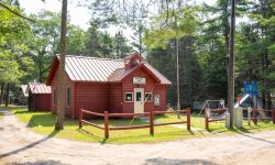 Bois Blanc Pines School. A small red building