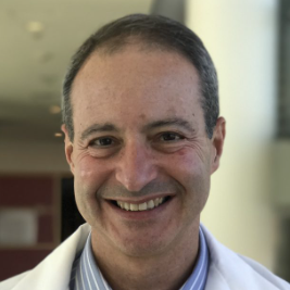 Headshot of ACS professor, J. Silvio Gutkind, in his lab