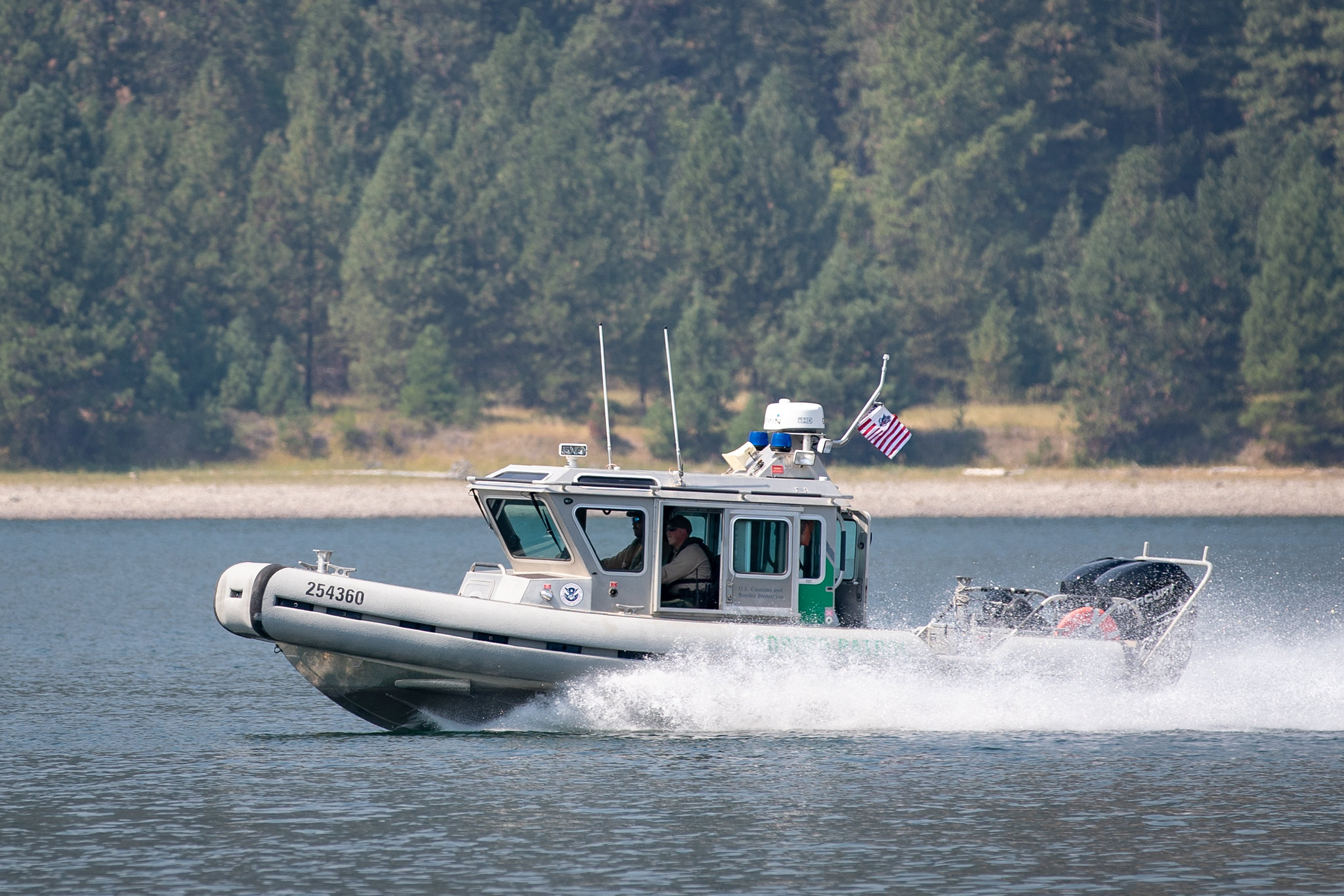 Border Patrol agents patrol a river near the U.S.- Canada border. 