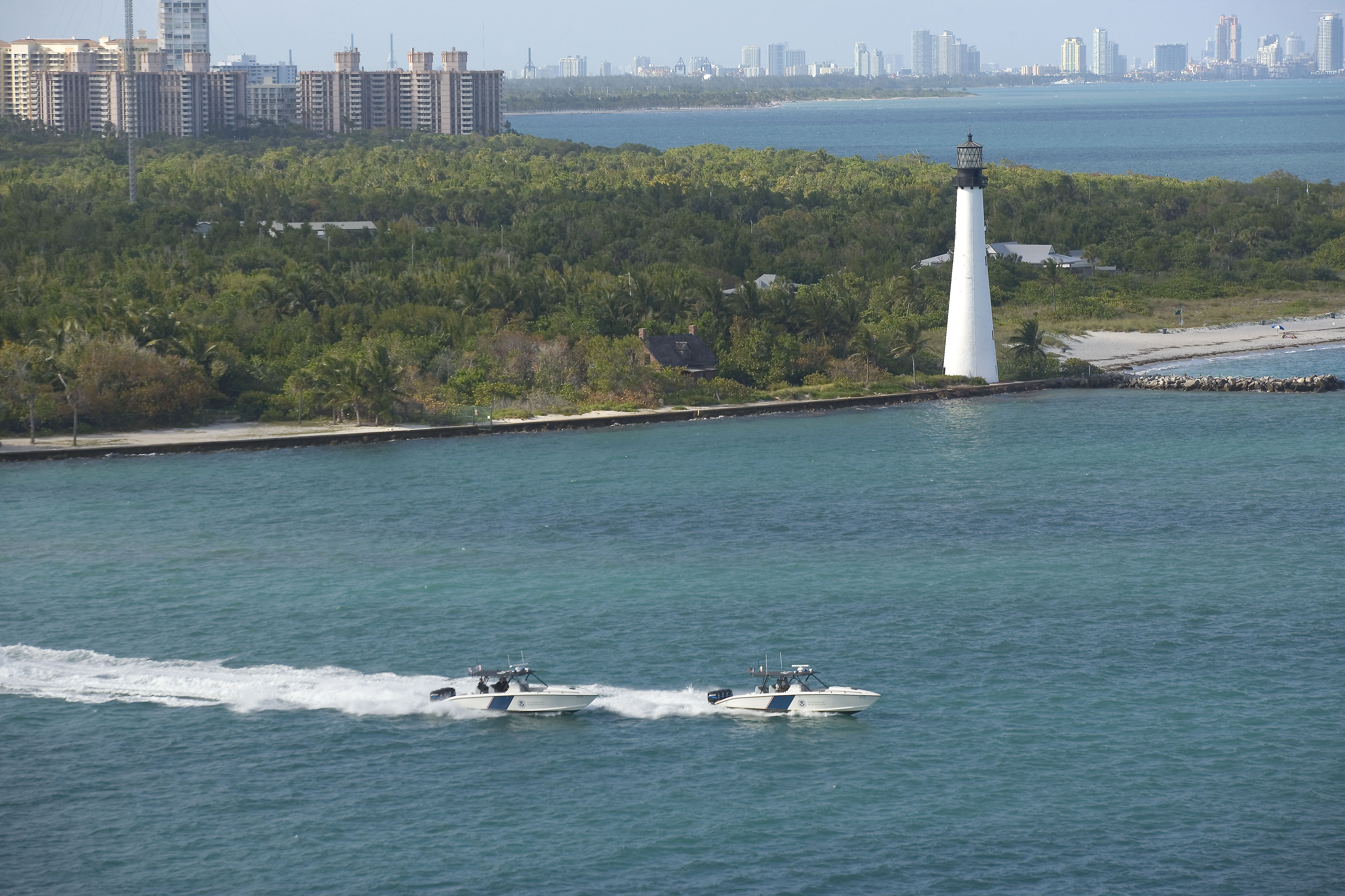 Two CBP Marine unit Midnight Express boats patrol the waters off of Florida's shores.