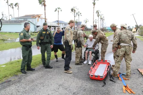 Rio Grande Valley Sector Border Patrol Special Operations Agents assist disaster survivor trapped on second floor of his home.