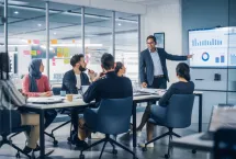 Consultant presenting in a conference room