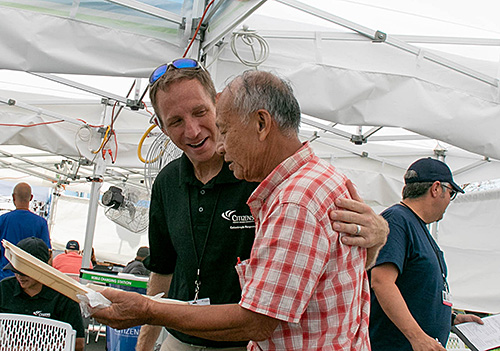 Citizens representative helping a customer during a catastrophe.