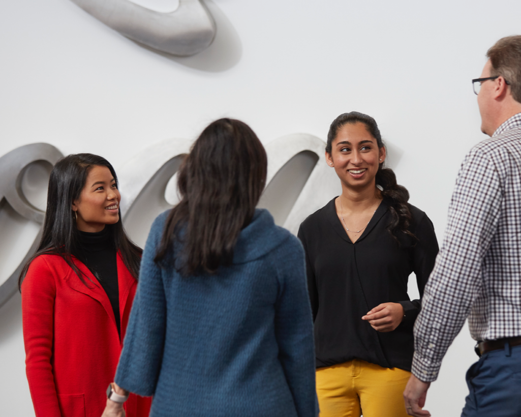 A diverse group of Coca-Cola employees