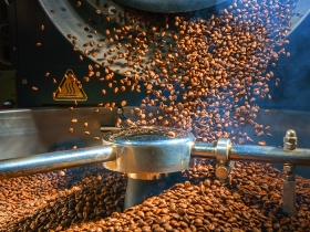 Mixing roasted coffee