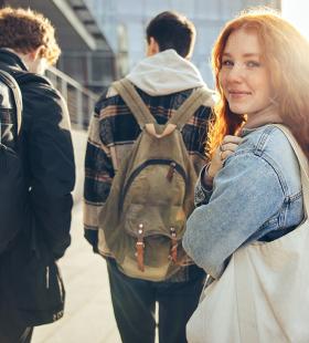 Kids going to school, girl facing