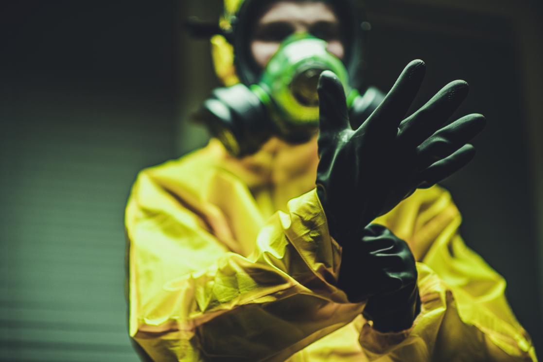 hospital worker wearing hazmat suit