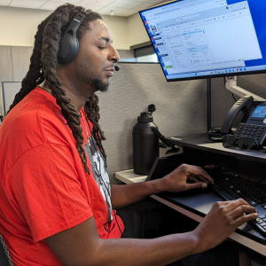 Jamal working at his desk.