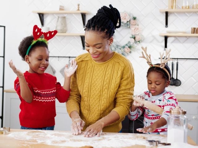 Family making holiday cookies