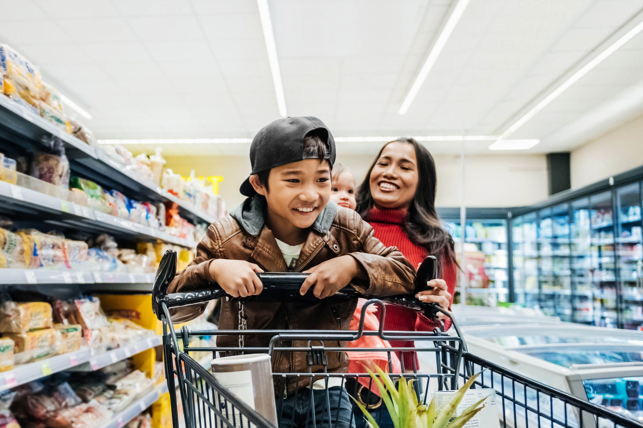 Family having fun while out buying groceries