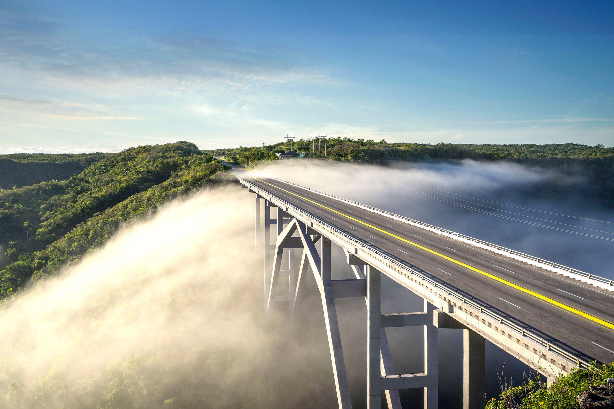 Modern bridge in the mist in Cuba