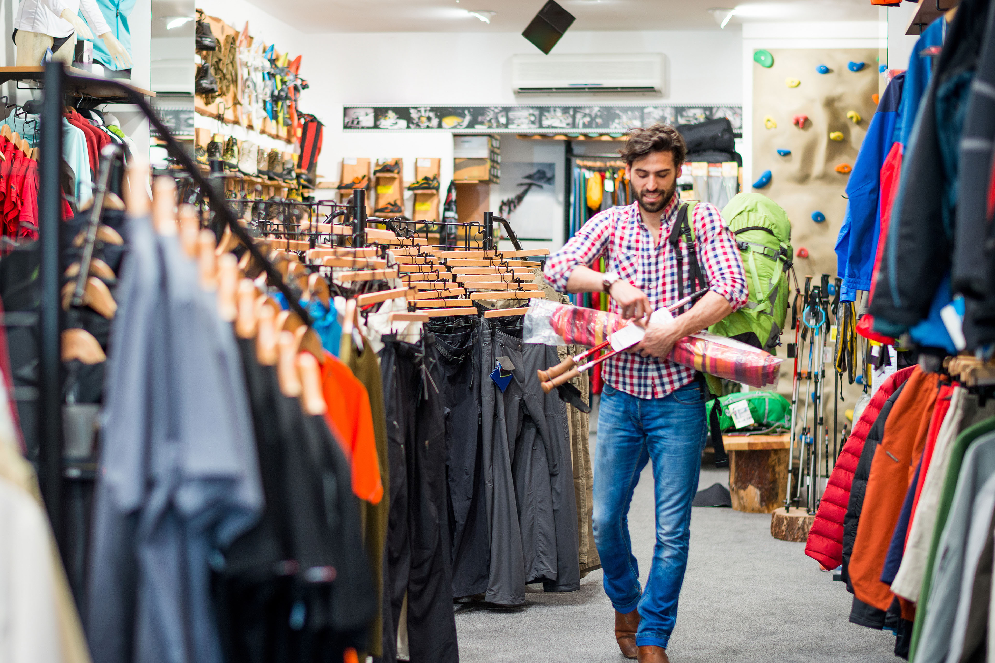 Male customer in outdoor equipment store