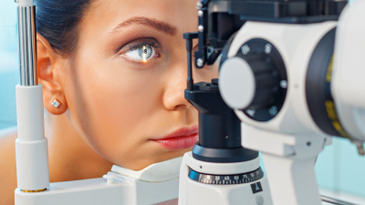 young woman having a medical eye exam