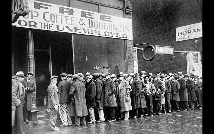 <p>Unemployed men queued outside a depression soup kitchen opened in Chicago by Al Capone, 1931 (U.S. Information Agency&nbsp;via <a href="https://commons.wikimedia.org/wiki/File:Unemployed_men_queued_outside_a_depression_soup_kitchen_opened_in_Chicago_by_Al_Capone,_02-1931_-_NARA_-_541927.jpg">Wikimedia Commons</a>)</p>