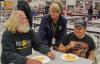 FEMA Community Relations team member talks with survivors at the Red Cross shelter at Pleasantville High School. Photo by Liz Roll/FEMA