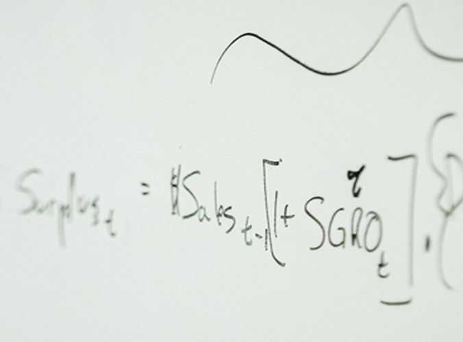 Formula on white board - TILE