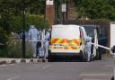 Forensic officers at an address in Shepherd’s Bush, west London, after human remains were found in two suitcases near the Clifton Suspension Bridge in Bristol (Lucy North/PA)