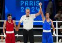 Imane Khelif, right, has dismissed the gender row after reaching the women’s welterweight final (Peter Byrne/PA)