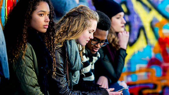 a group of teenagers hanging out