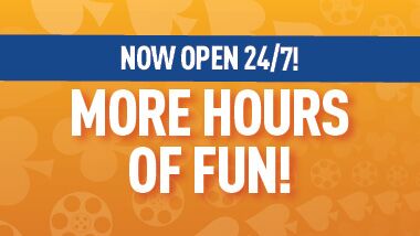 Orange background with blue ribbon that reads "More hours of fun! Now open 24/7!"