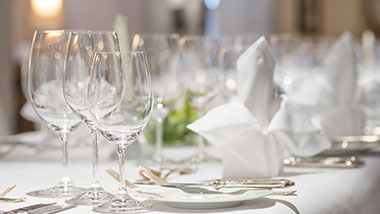 Table setting for events with glasses and napkins at Argosy Casino Alton.