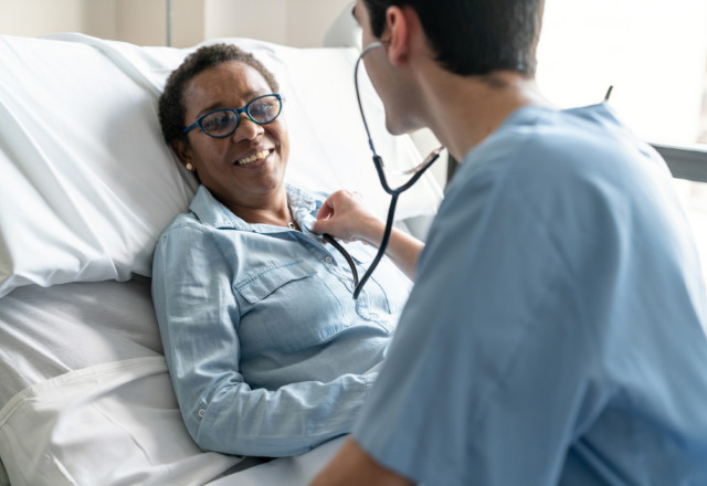 elderly patient in bed - heart and vascular institute