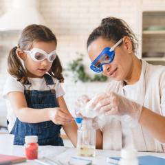 Researcher teaching child about science. Image credit: Inside Creative House.