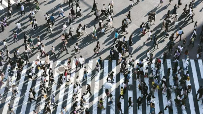 People crossing the street on a crosswalk