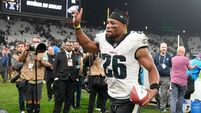 Saquon Barkley leads Eagles to victory in Brazil as Packers’ Love limps off field