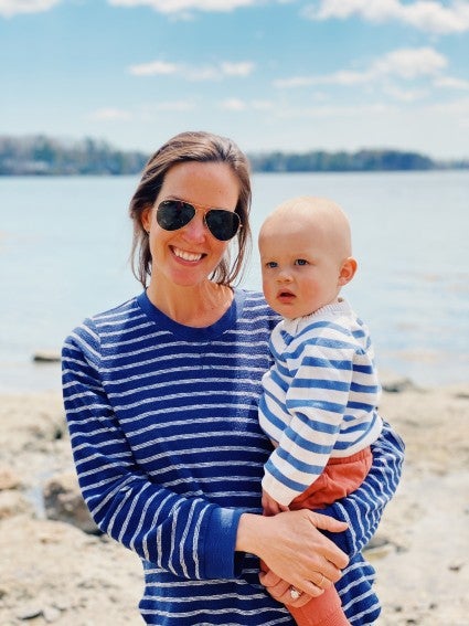 Posie Brien and her son on the beach