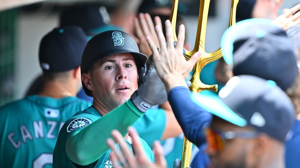 Dylan Moore #25 of the Seattle Mariners celebrates after hitting a two-run homer during the first inning against the Cleveland Guardians at Progressive Field on June 20, 2024 in Cleveland, Ohio. (Photo by Jason Miller/Getty Images)