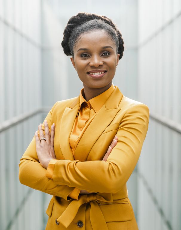 A smiling workshop instructor