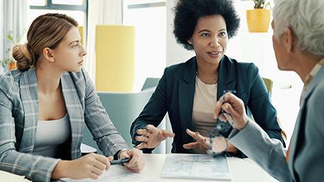 People collaborating around table