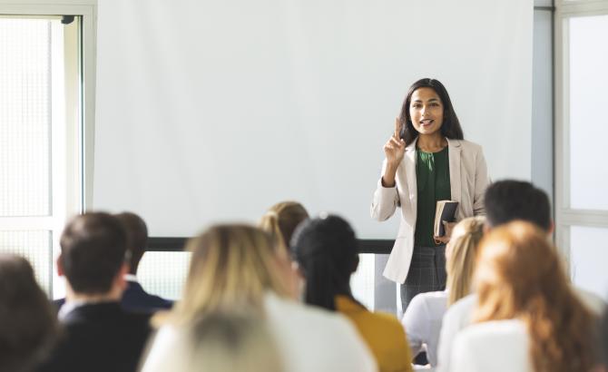 Law students in classroom listening to professor