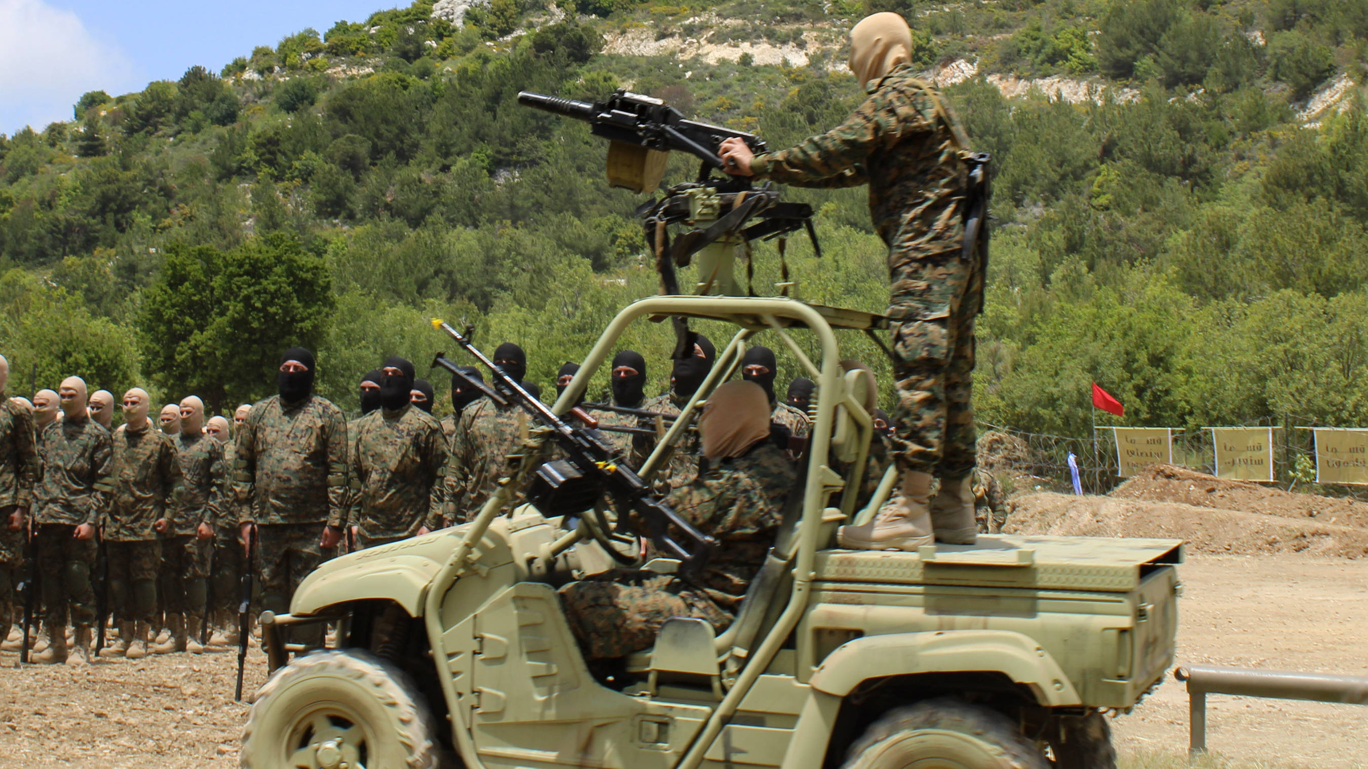 AGS-17 crew-served light grenade launcher mounted atop two PKM-type general-purpose machine guns (Hanna Davis/MEE)