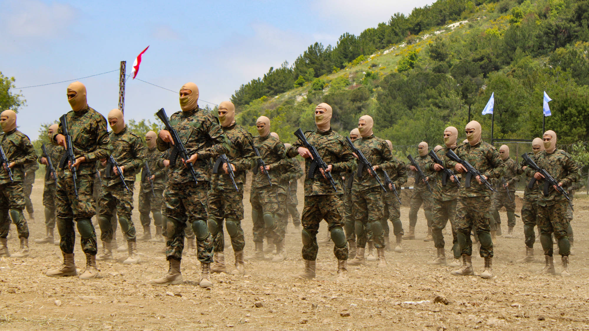 Hezbollah fighters with Russian-made AK-103 rifles (Hanna Davis/MEE)