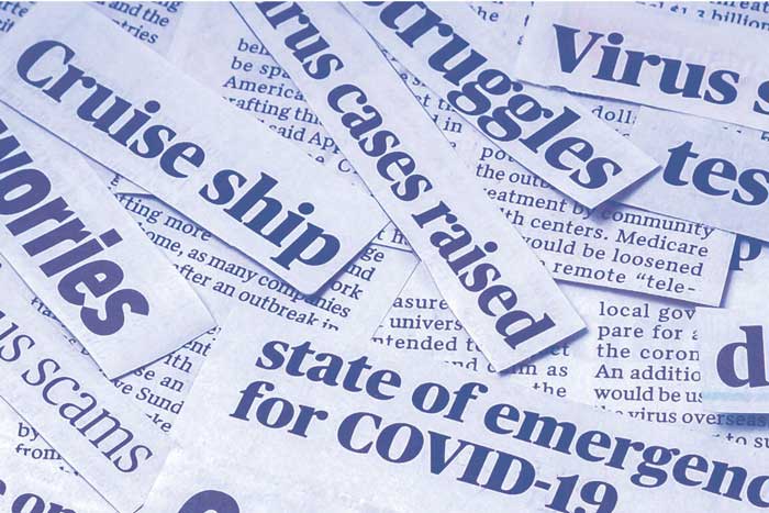 clips of newspaper headlines concerning Covid