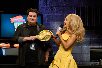 Bobby Moynihan and Ariana Grande during a sketch on SNL Episode 1698