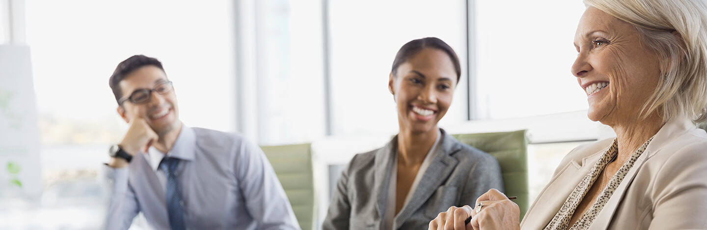 HR-team-smiling-at-dental-benefits-meeting.jpg