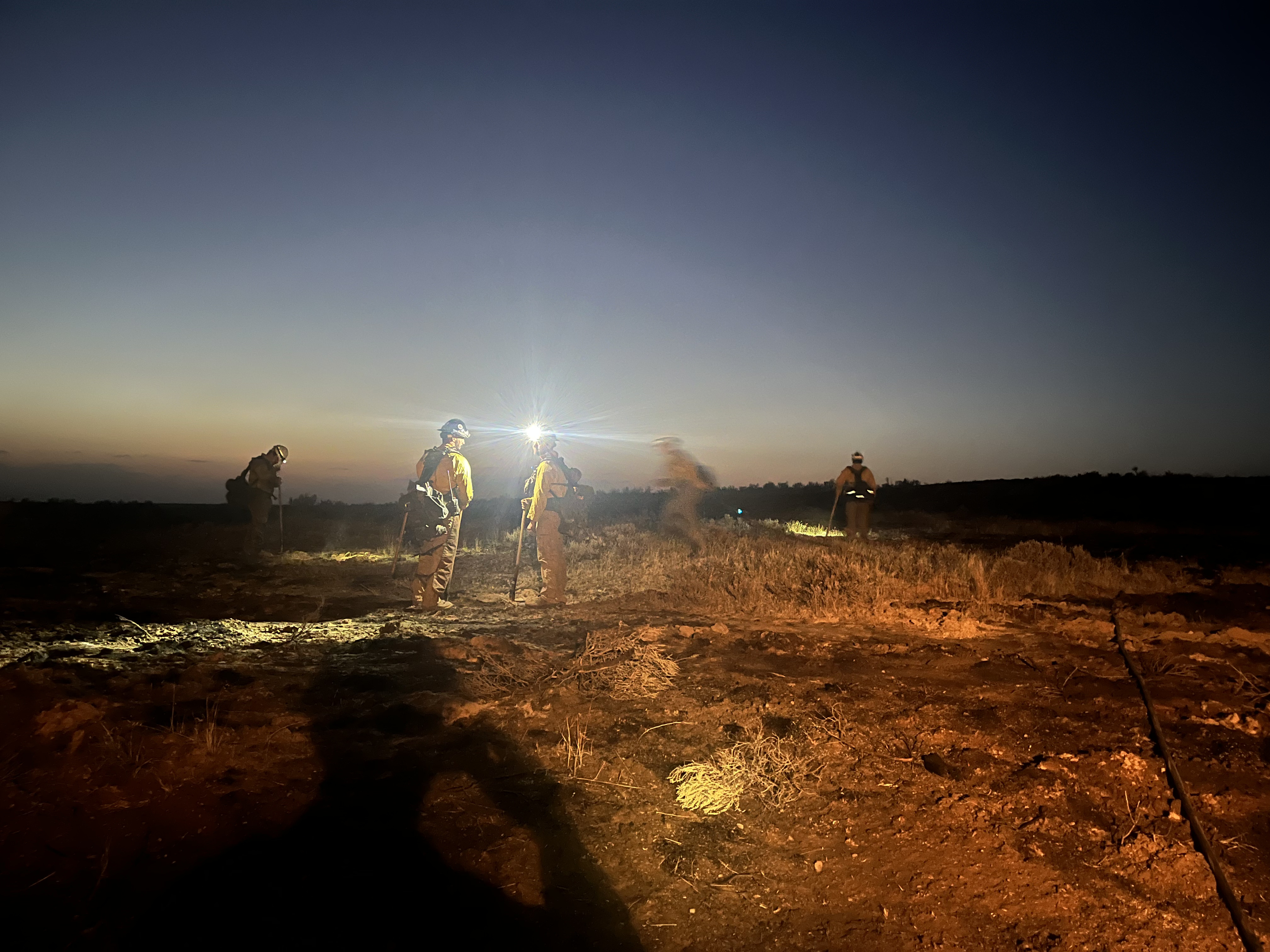 Spokane Veterans Crew works at night.