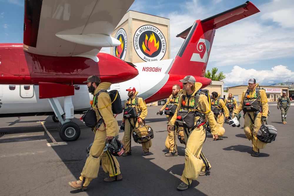 Smokejumpers preparing to board