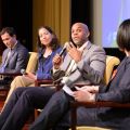 An image showing, from Left to Right, Dr. Benjamin Le Cook, Dr. Jessica Goodkind, Dr. Sidney Hankerson, and Dr. Christina Borba as they speak on a panel at NIMH’s 75th Anniversary symposium, Amplifying Voices and Building Bridges: Toward a More Inclusive Future, on March 18, 2024. Courtesy of NIMH.